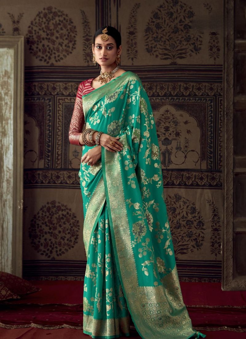 Pure dola silk saree with meenakari work in green