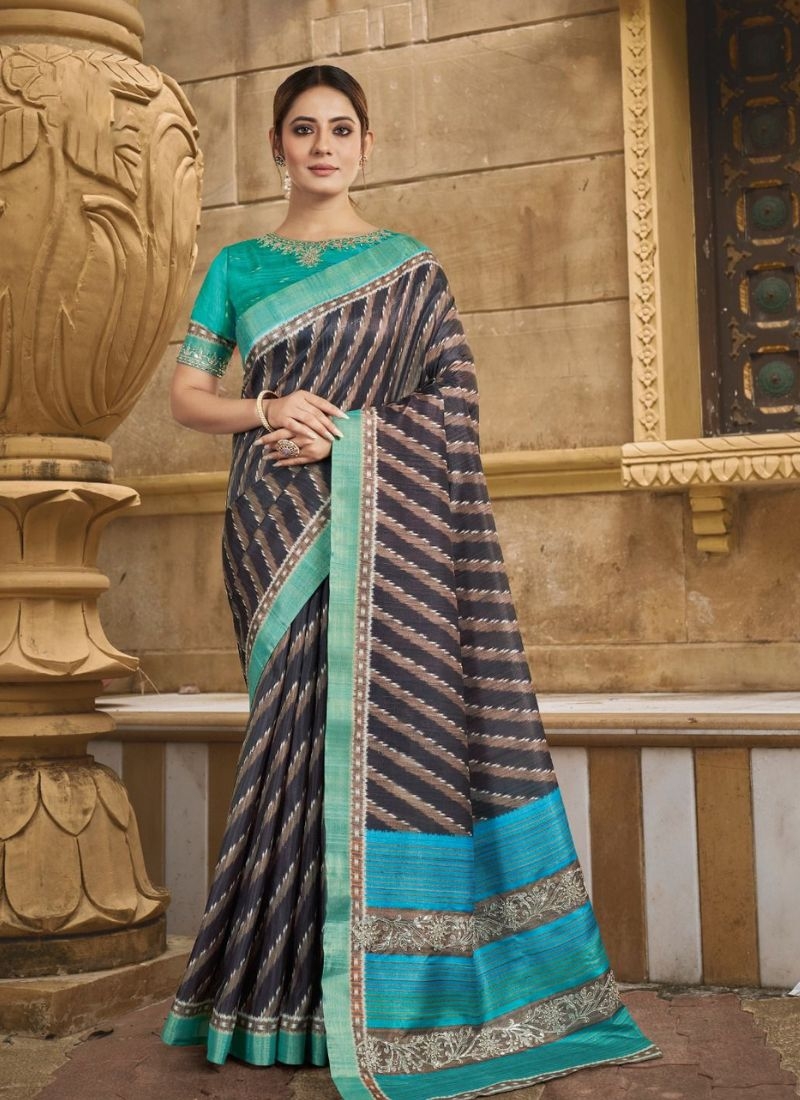 Stunning silk saree with stone work and mirror work in pastel green