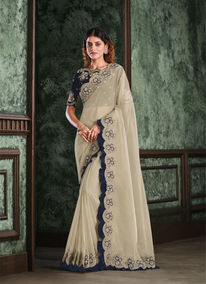 Premium zari work saree with stone work embroidery in creme