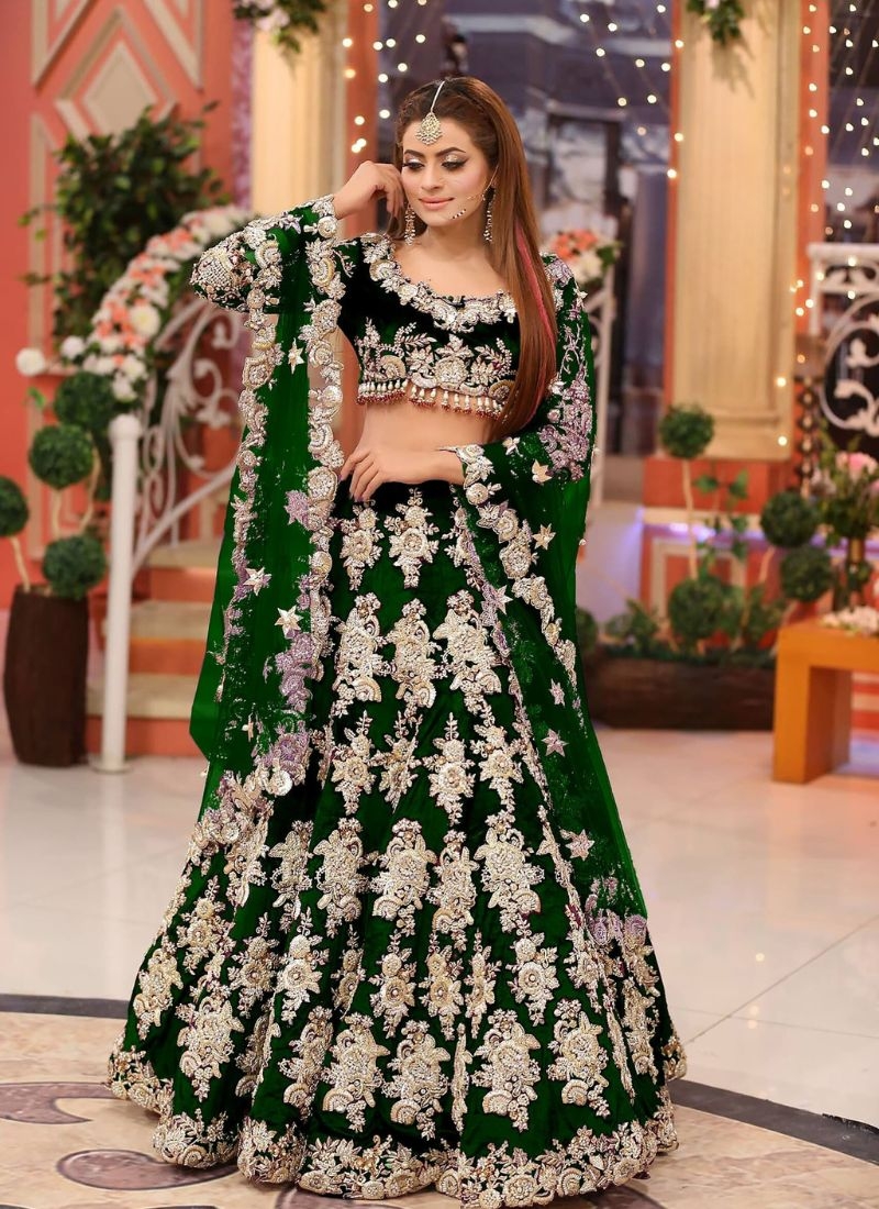 Beautiful velvet lehenga with embroidered dupatta in dark green