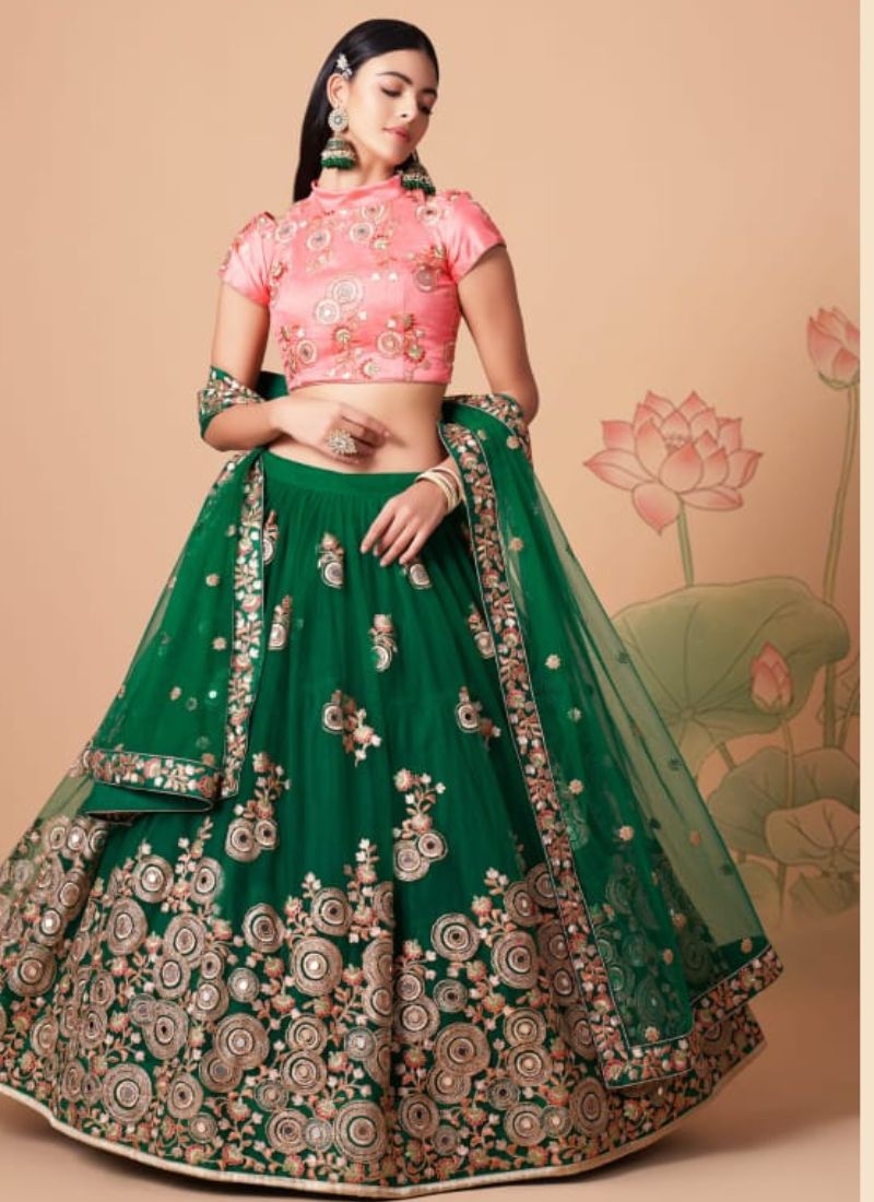 Soft net embroidered lehenga choli with mirror embroidery in dark green