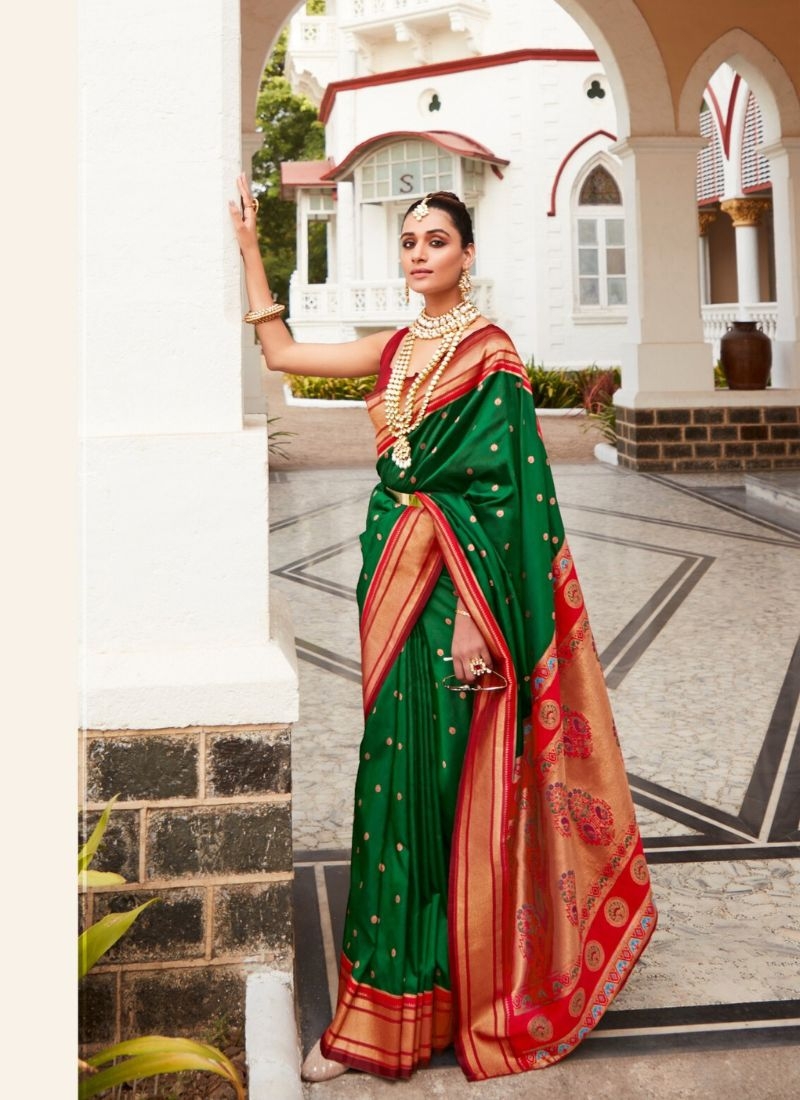 Exquisite pathani silk saree with minakari work in dark green