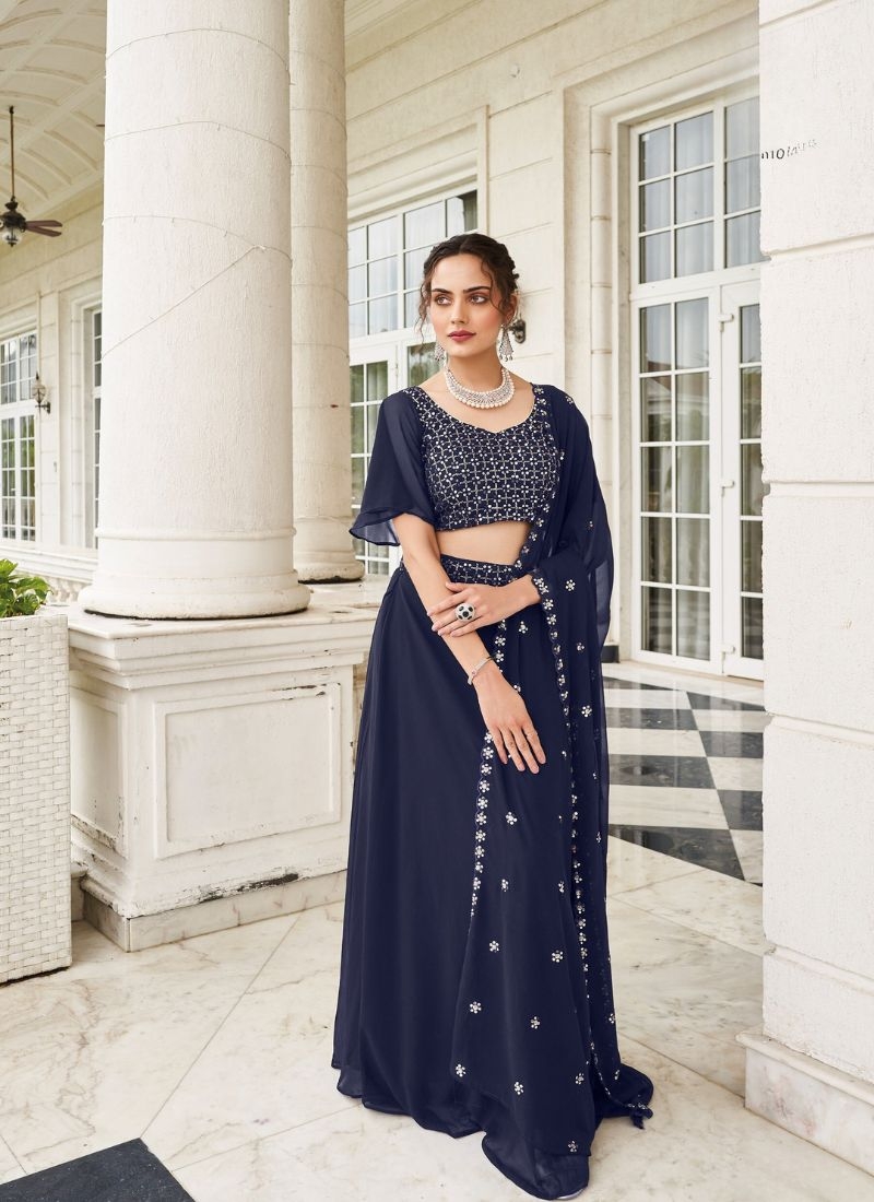 Trendy georgette lehenga with embroidered sleeve less blouse in dark blue