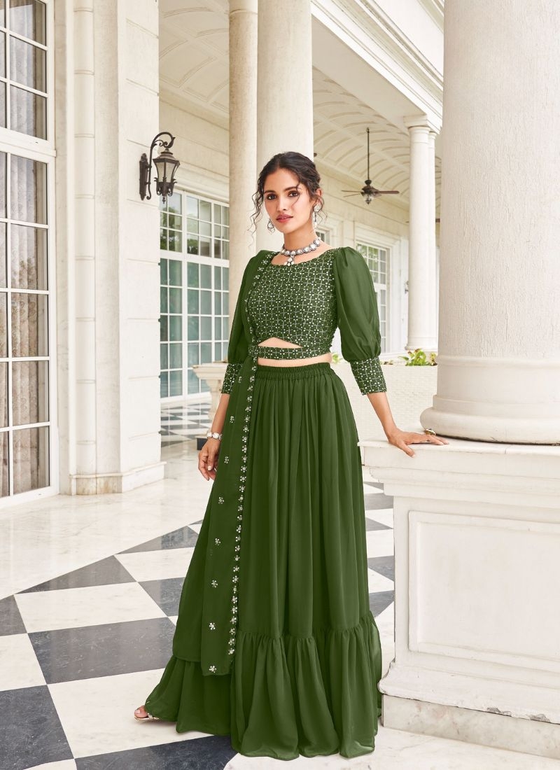 Trendy georgette lehenga with embroidered sleeve less blouse in dark green
