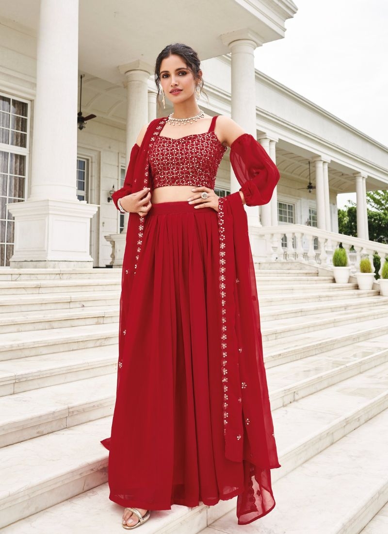 Trendy georgette lehenga with embroidered sleeve less blouse in red
