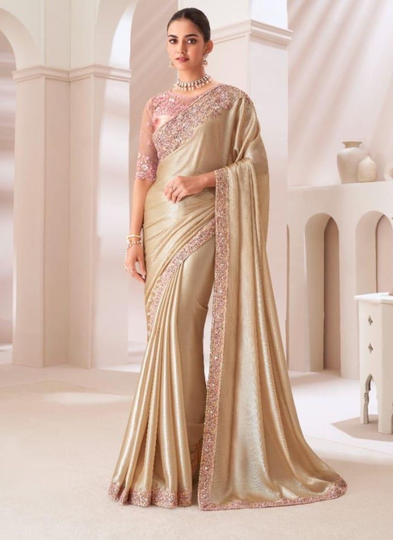 Designer silk saree with embroidered blouse in Beige