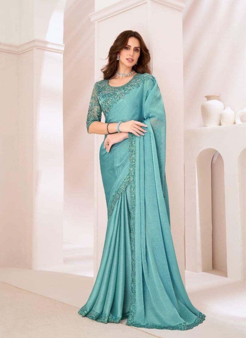 Designer silk saree with embroidered blouse in green