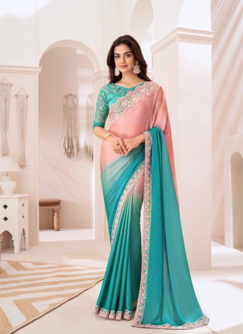 Designer silk saree with embroidered blouse in light green