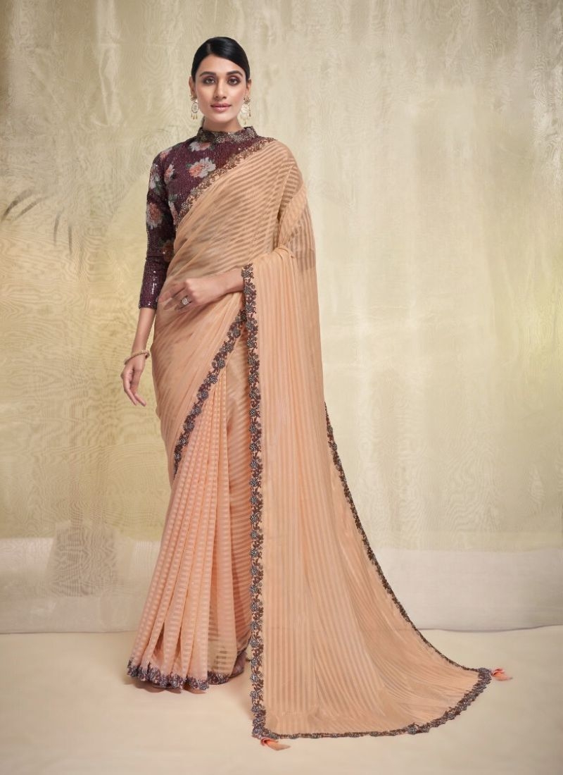 Exquisite wedding saree with embroidered blouse in cream