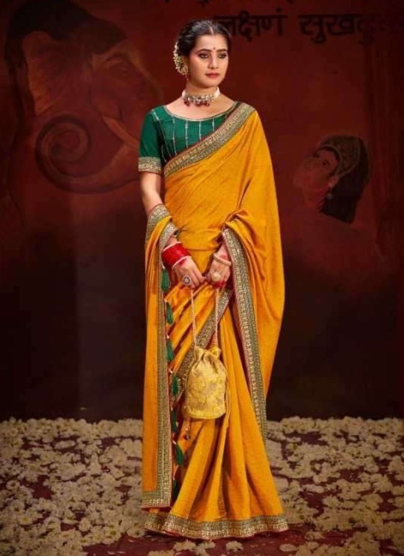 Trendy silk saree with beautifully embroidered blouse in yellow