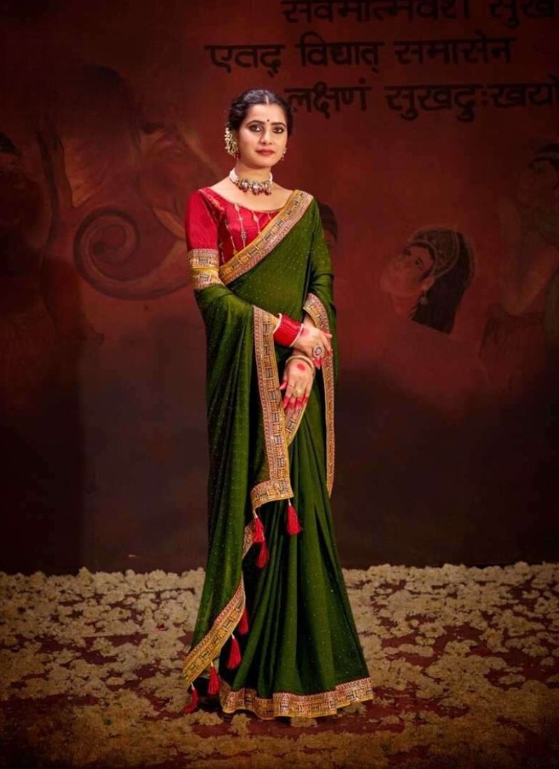 Trendy silk saree with beautifully embroidered blouse in mehandi green