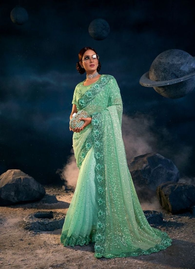 Exquisite silk saree with embroidered  silk blouse in sea green