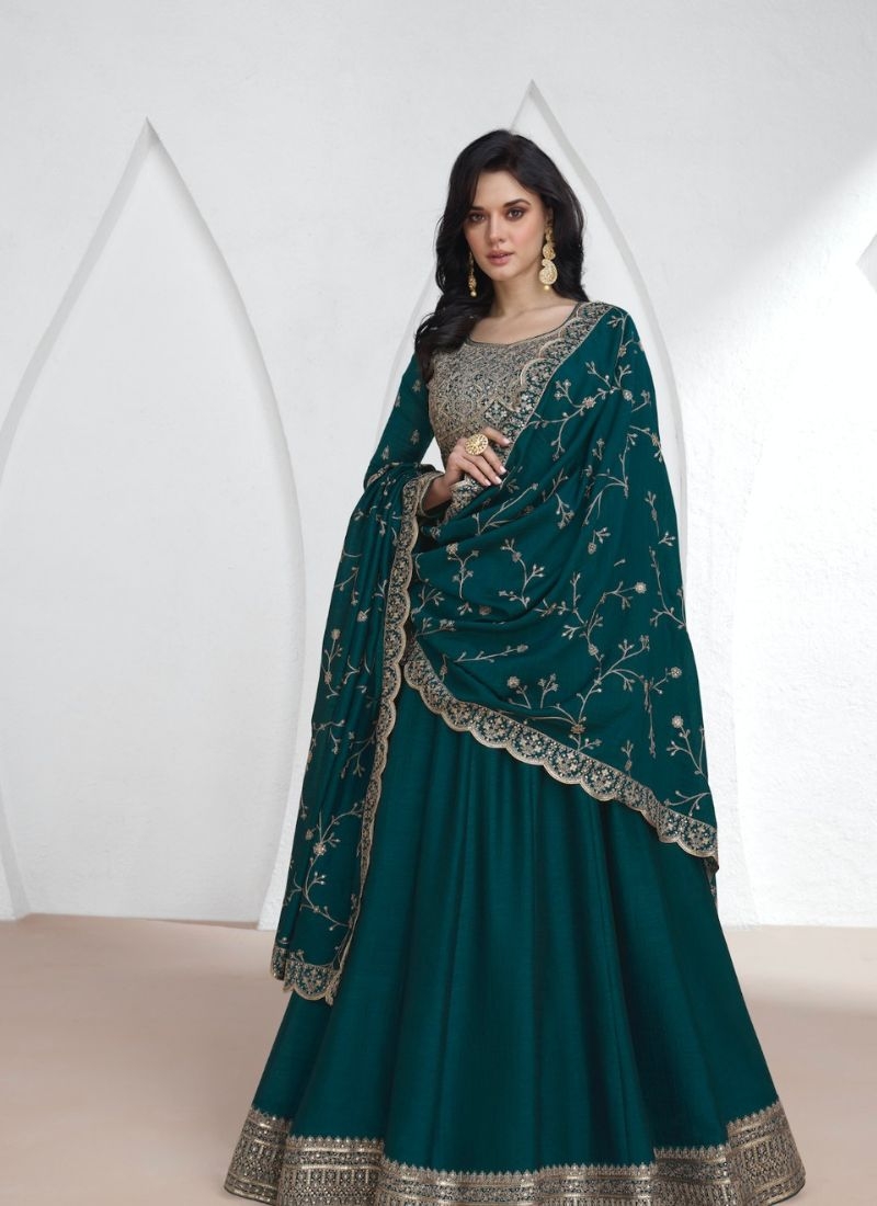 Beautiful silk anarkali suit with mirror work embroidery in dark green