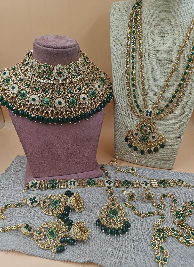 Beautiful gold plated necklace set in teal green