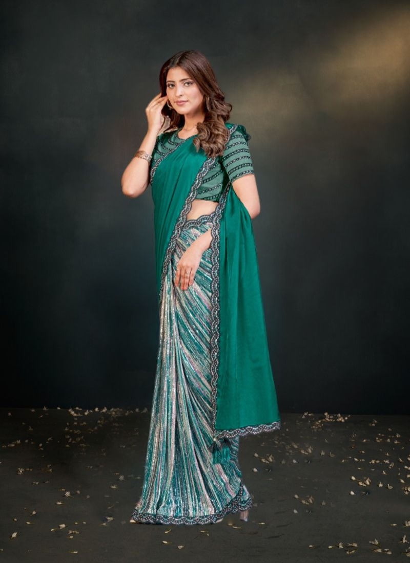 Designer embroidered silk saree in green