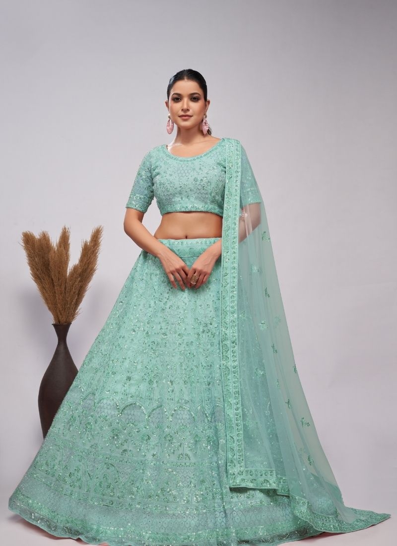 Stunning lehenga adorned by pearl and sequins bridal lehenga green