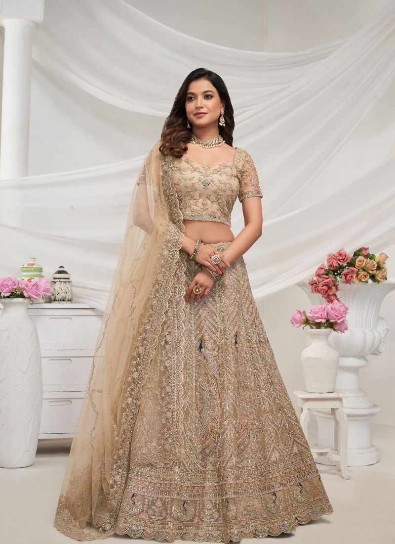 The bagh collection: white fawn peacock Embroidered bridal lehenga in light brown