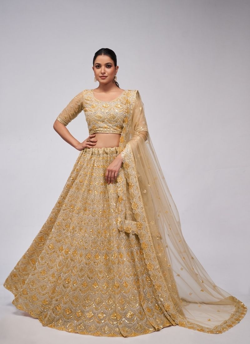 The dazzling lehenga is perfect for the contemporary bride. in mustard