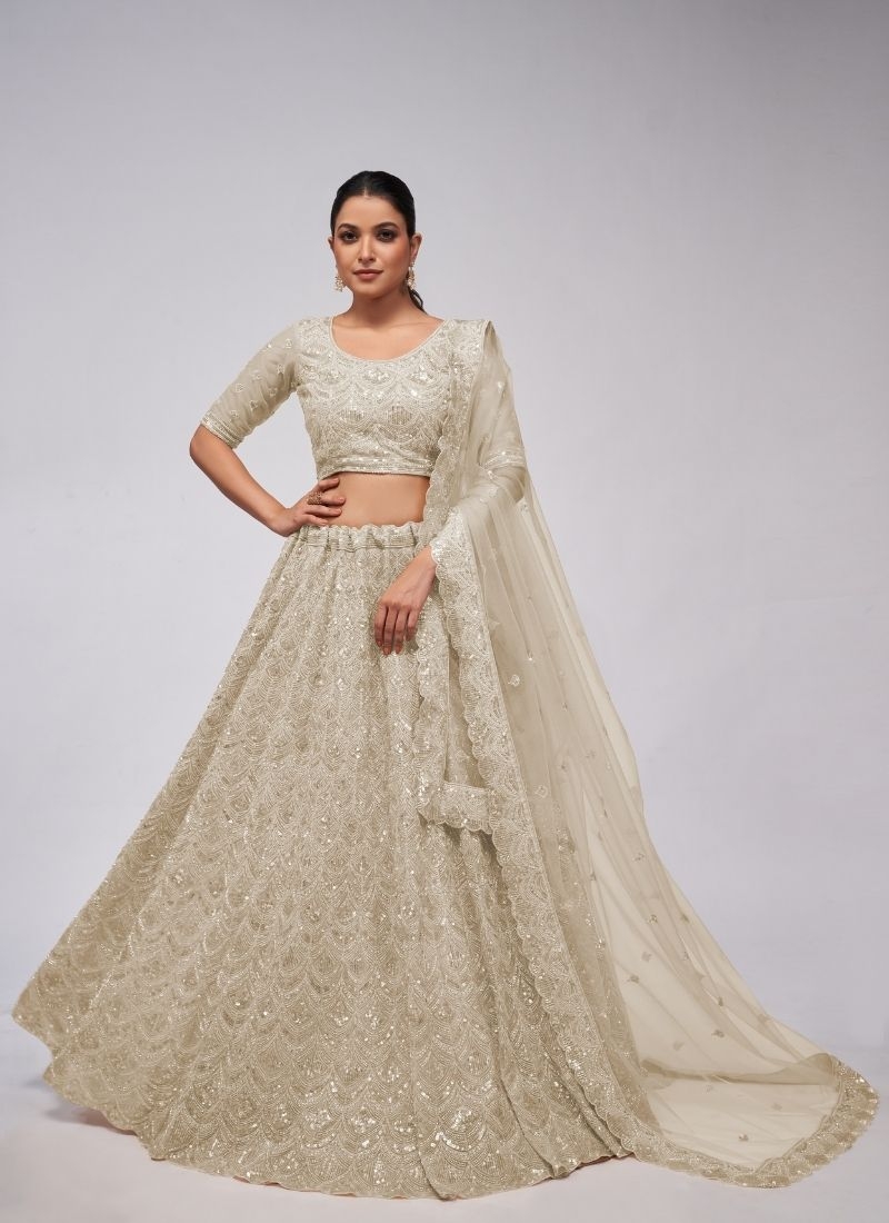 The dazzling lehenga is perfect for the contemporary bride. in beige