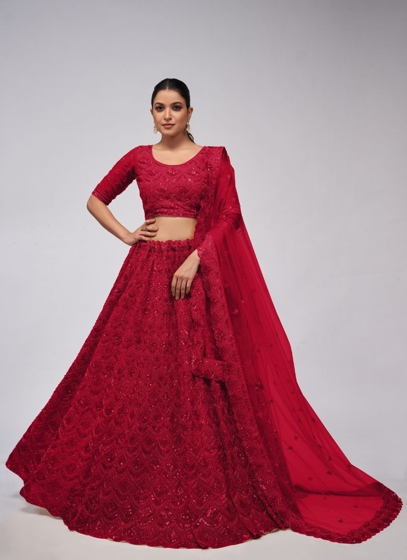 The dazzling lehenga is perfect for the contemporary bride. in red