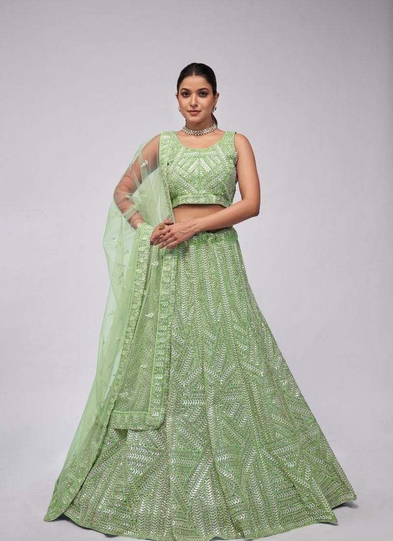 Elegant Ensemble leaves motifs sequins lehenga sangeet ceremony in light green