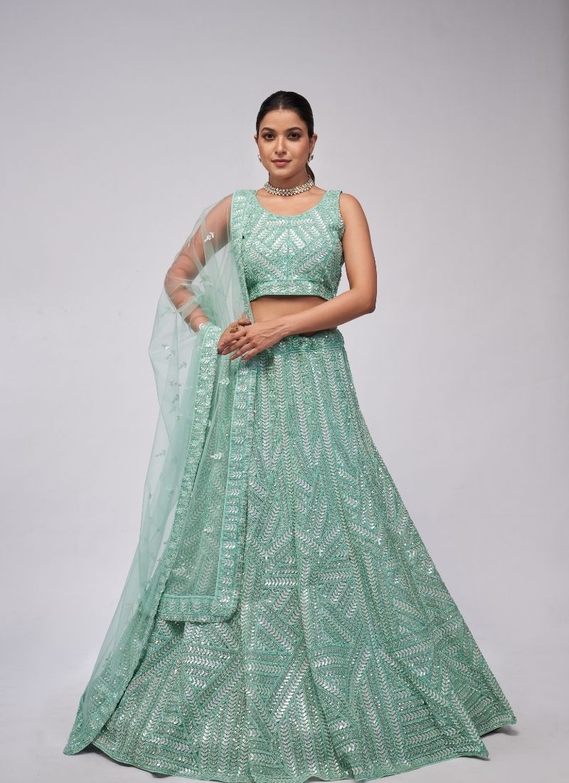 Elegant Ensemble leaves motifs sequins lehenga sangeet ceremony in  dark green