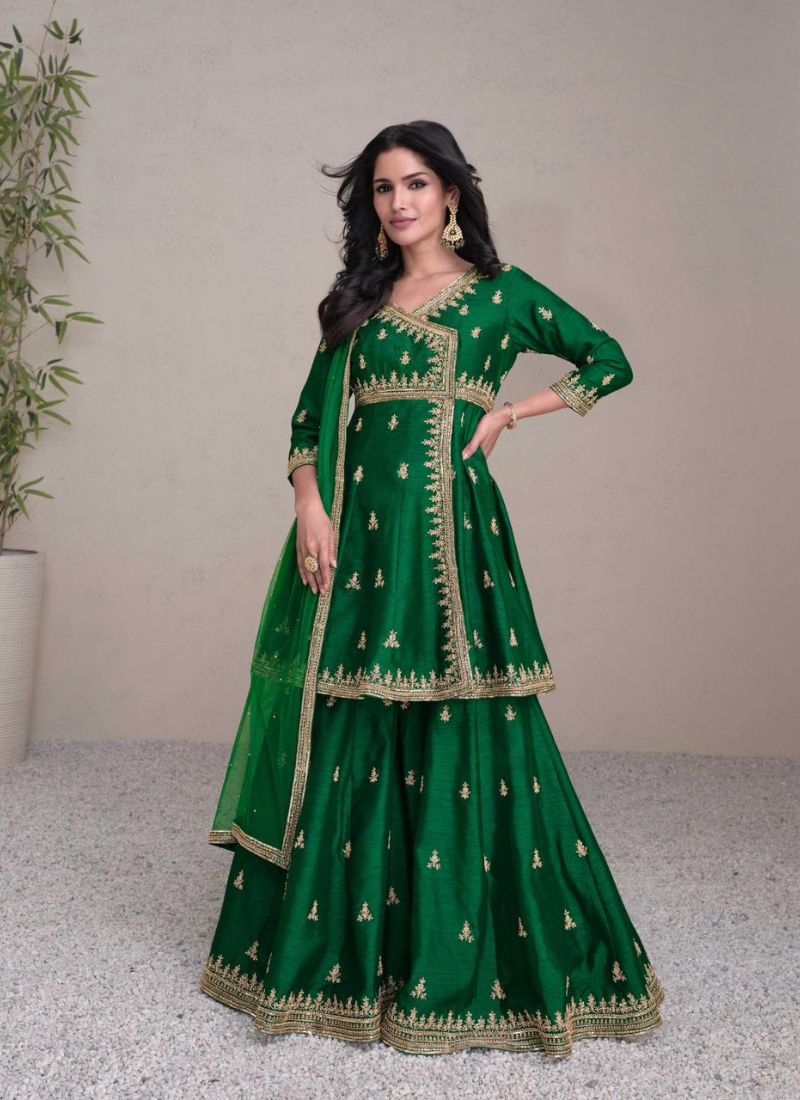 Beautiful pearl embroidered silk sharara suit in dark green