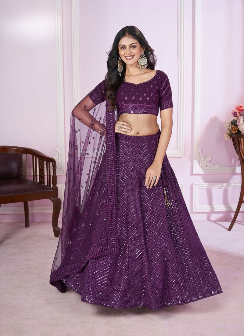 Exquisite embroidered georgette lehenga choli with net dupatta in dark violet