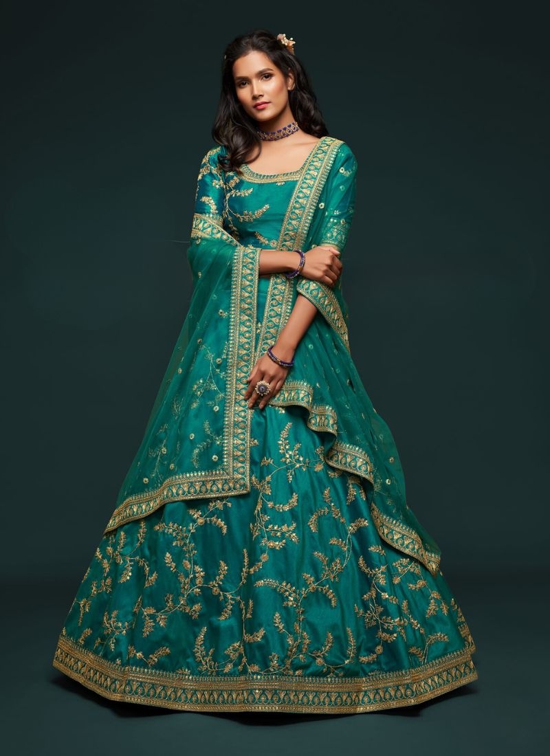 Beautiful embroidered georgette lehenga choli in dark green