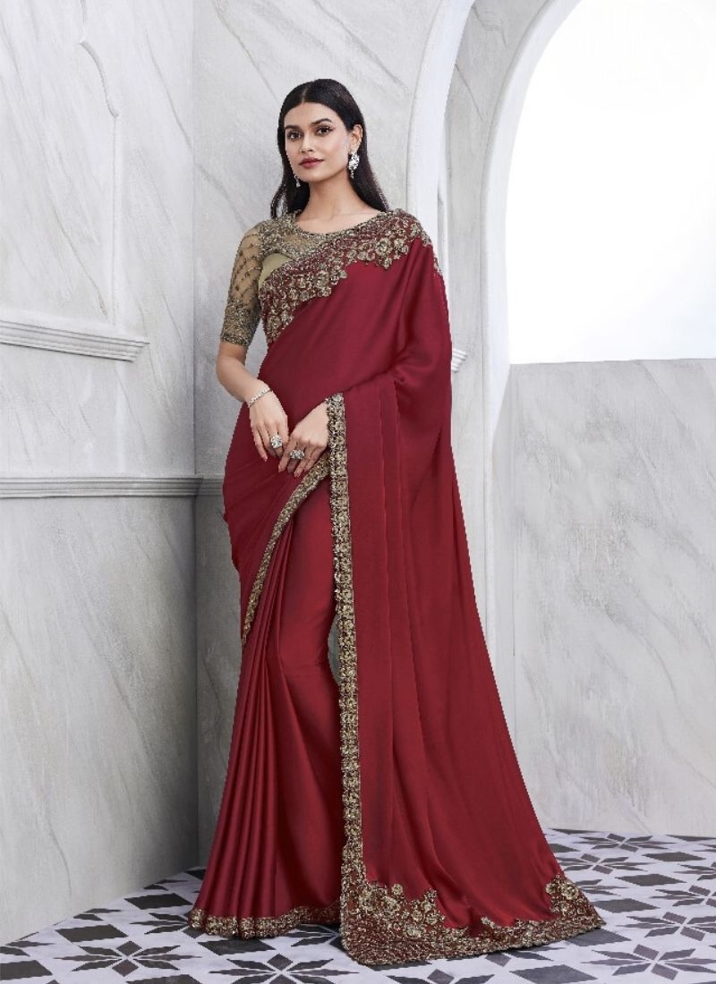 Exquisite embroidered silk saree in red