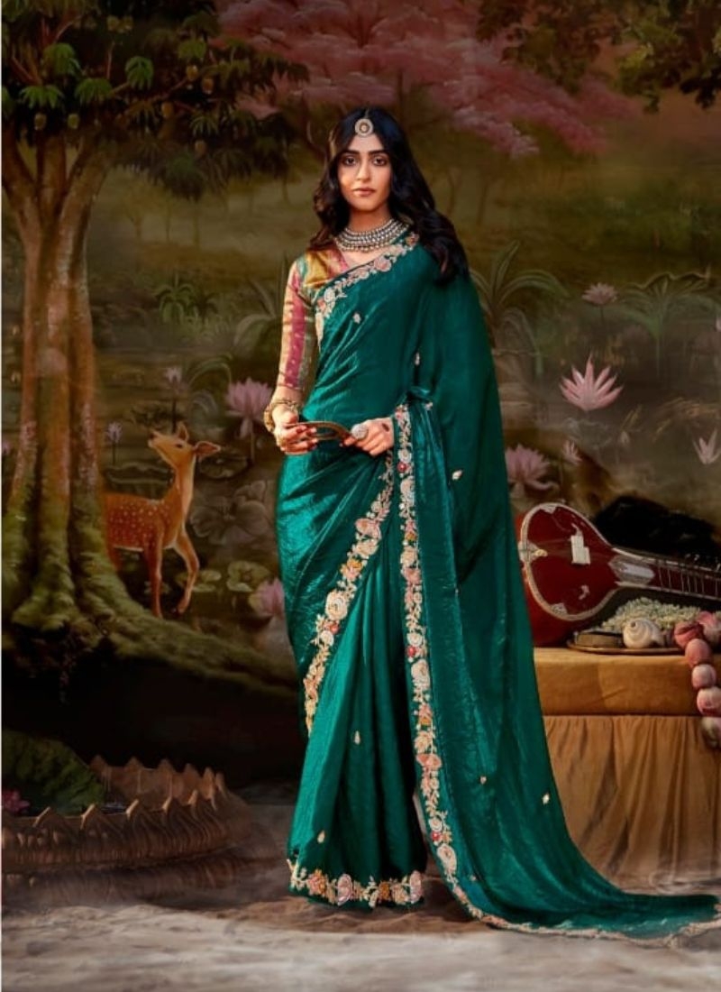 Stunning embroidered chiffon saree in dark green