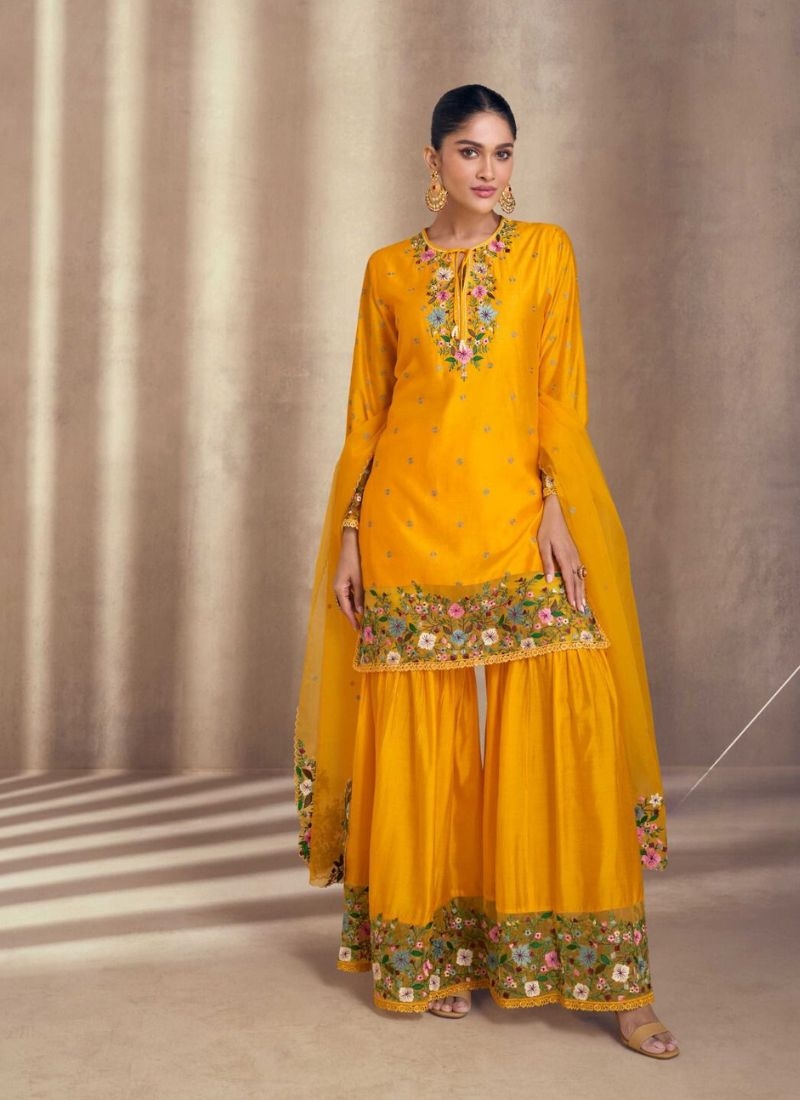 Exquisite embroidered premium silk sharara suit in yellow