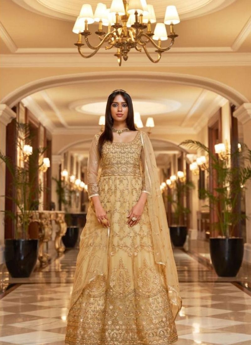 Exquisite embroidered gown in mustard