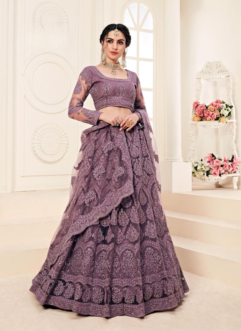 Gorgeous embroidered wedding lehenga choli in purple