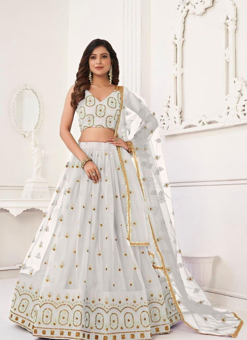 Stunning embroidered net lehenga choli in white