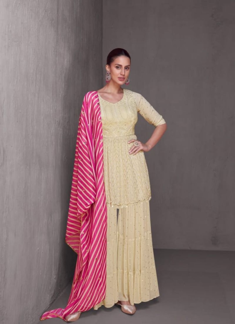 Beautiful embroidered chinon sharara suit in cream