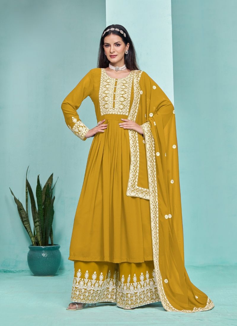 Stunning heavy embroidered georgette sharara suit in yellow