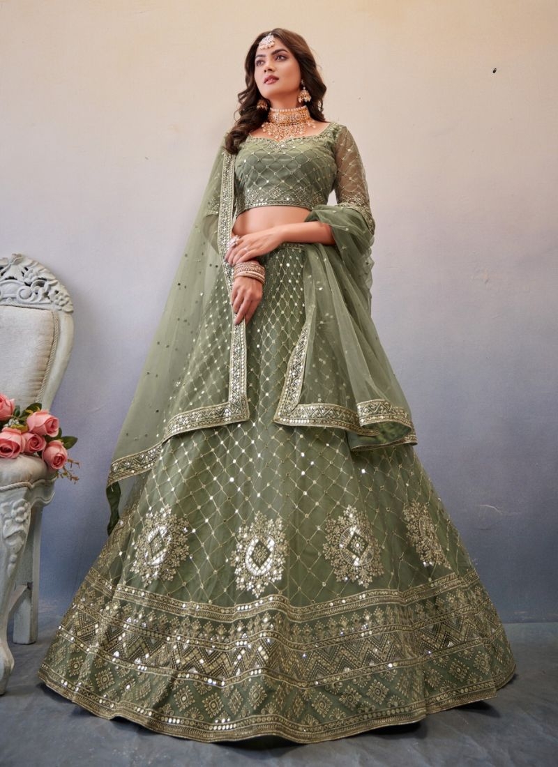 Exquisite thread embroidered net lehenga choli in mehandi green