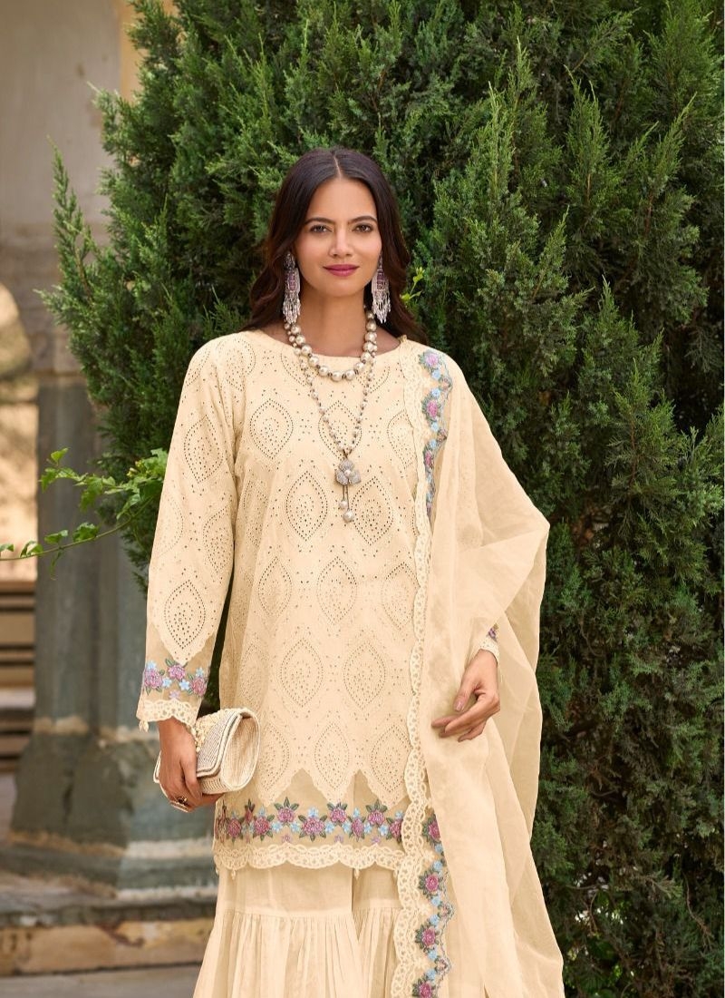 Beautiful embroidered cotton sharara suit in cream