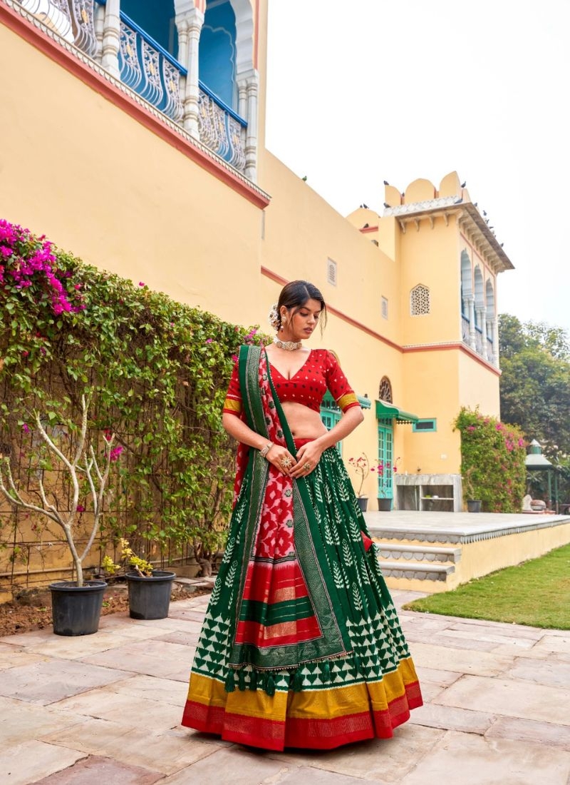 Designer printed tussar silk lehenga choli in dark green