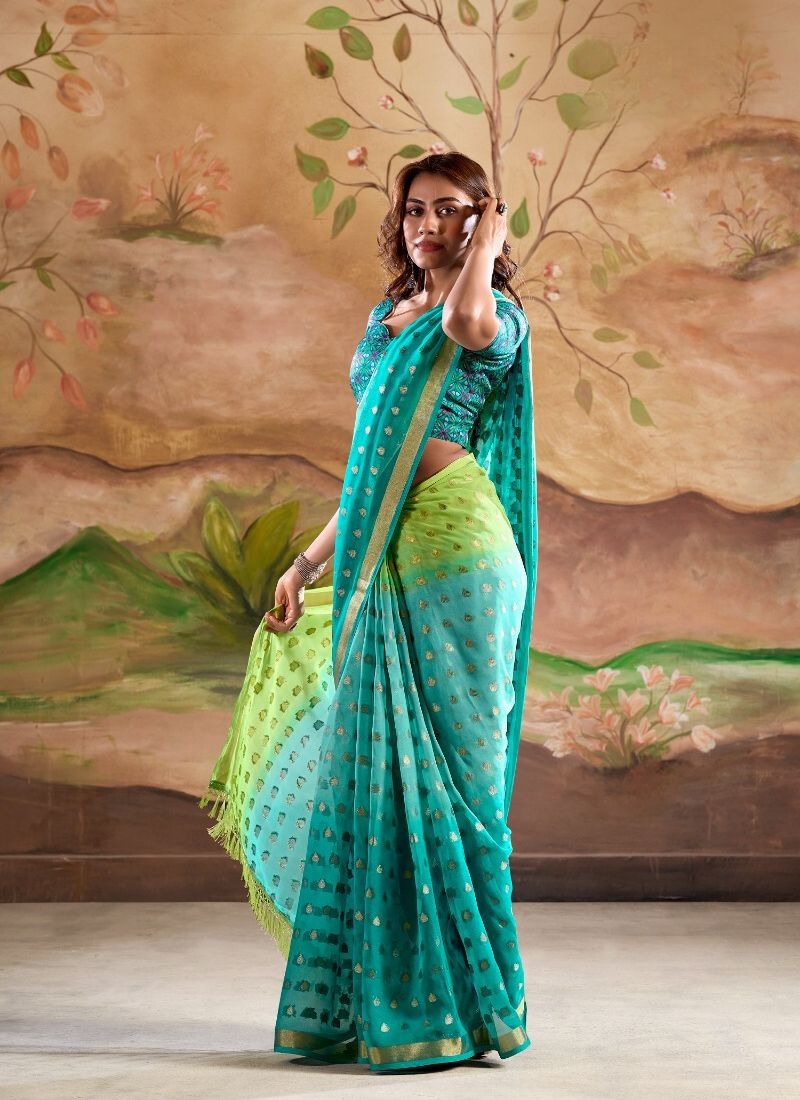 Digitally printed zari weaving georgette silk saree in green