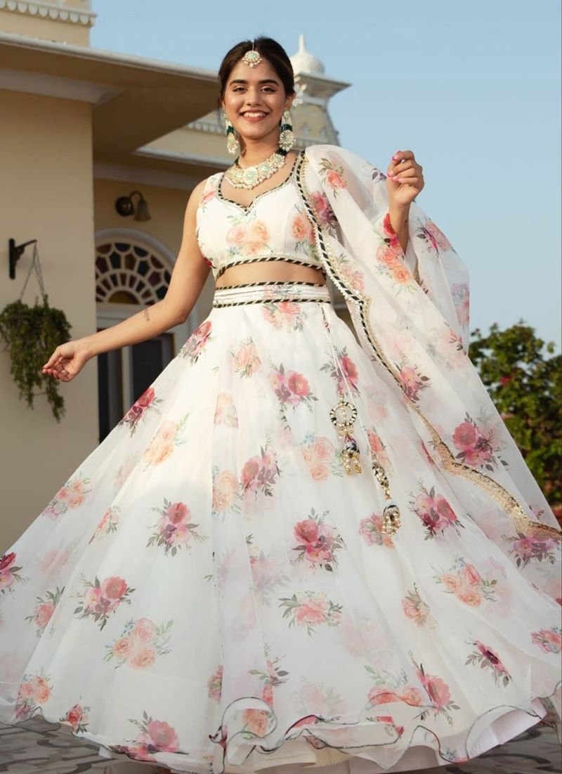 Beautifully embroidered organza silk lehenga choli in white