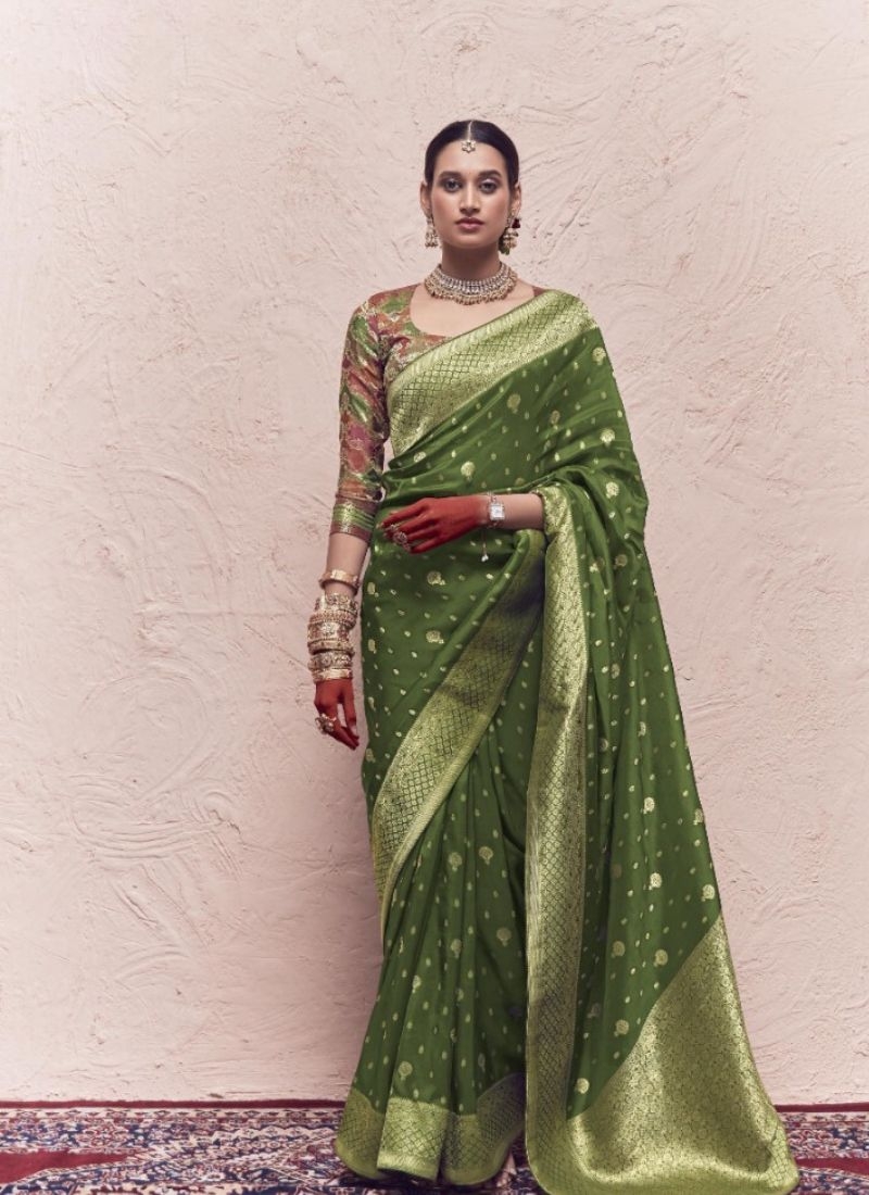 Designer hand weaving soft dola silk saree in dark green