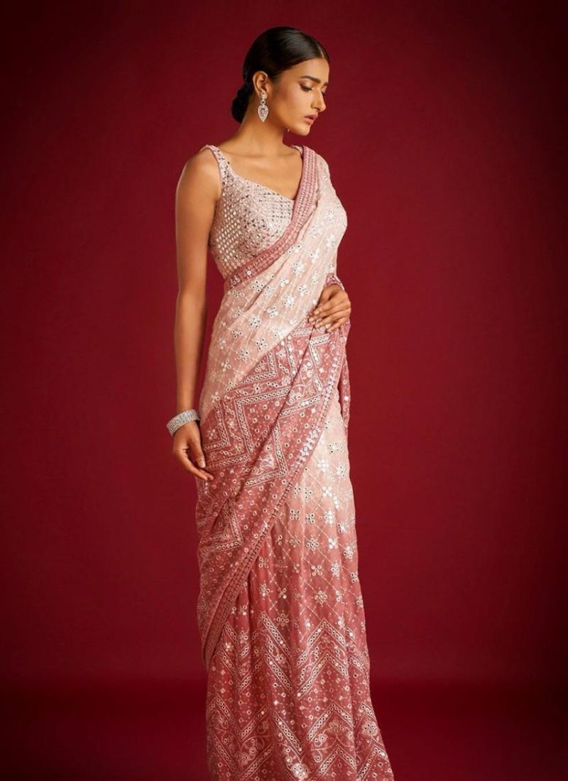 Beautifully embroidered soft georgette saree in pink