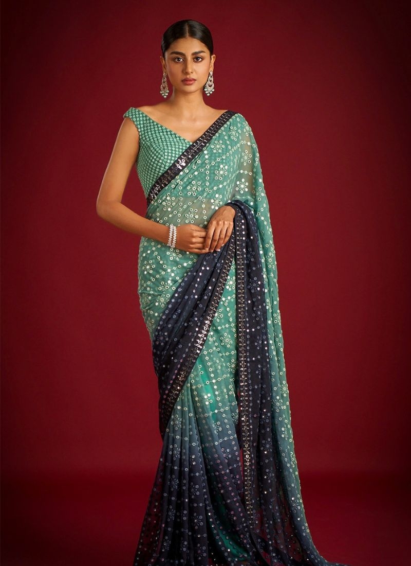 Beautifully embroidered soft georgette saree in green