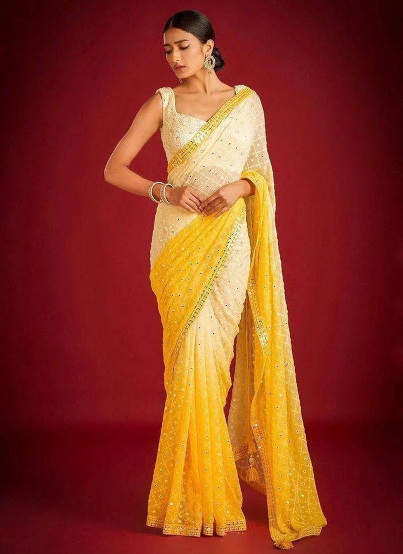 Beautifully embroidered soft georgette saree in yellow