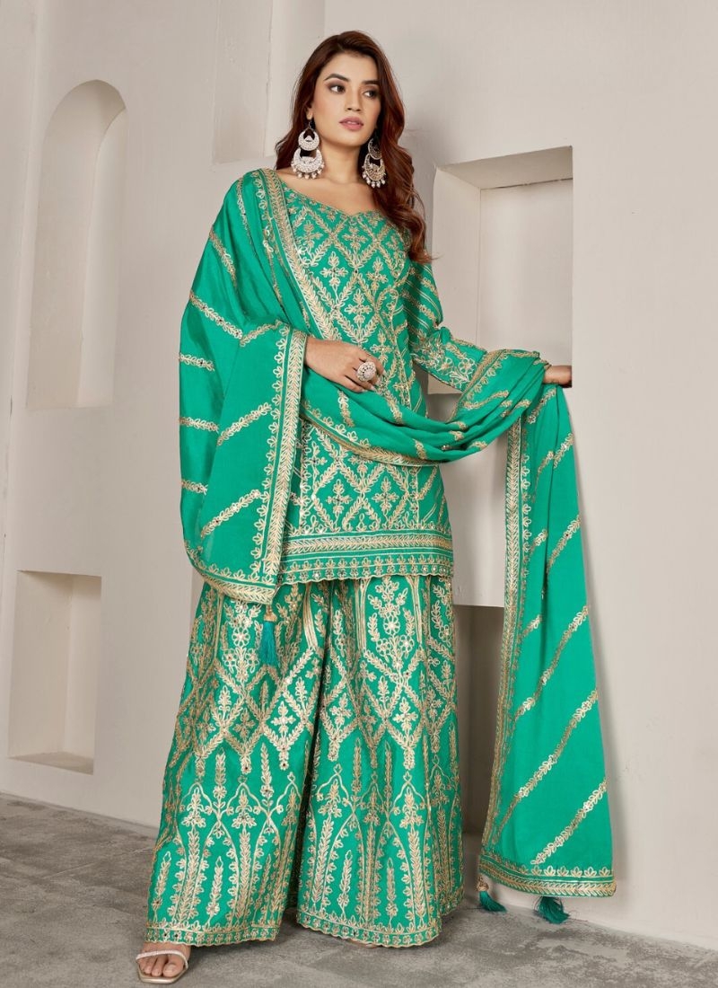 Exquisite heavy embroidered Chinon sharara suit in green