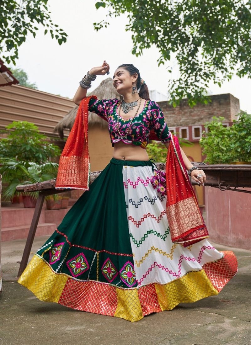 Beautiful mirror embroidered viscose rayon lehenga choli in dark green