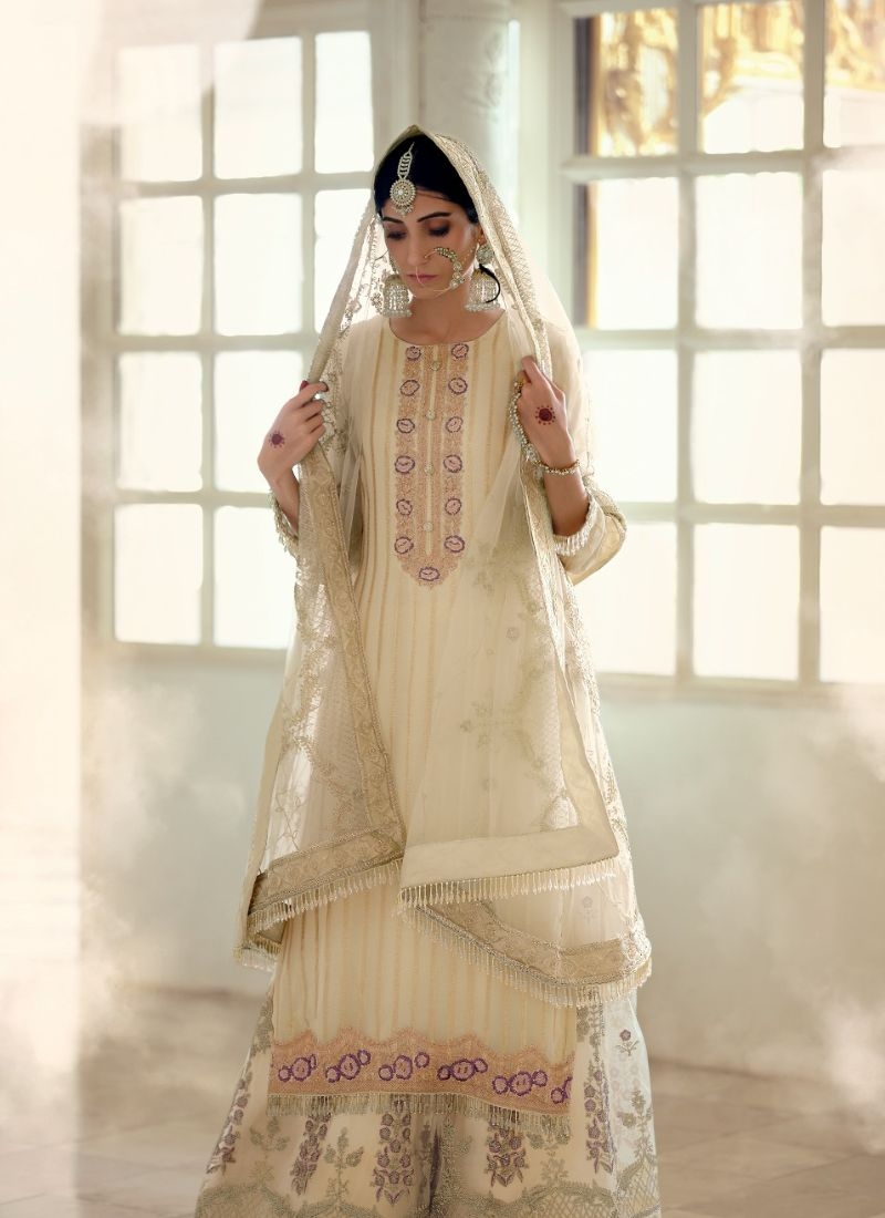 Designer patch embroidered georgette sharara suit in cream