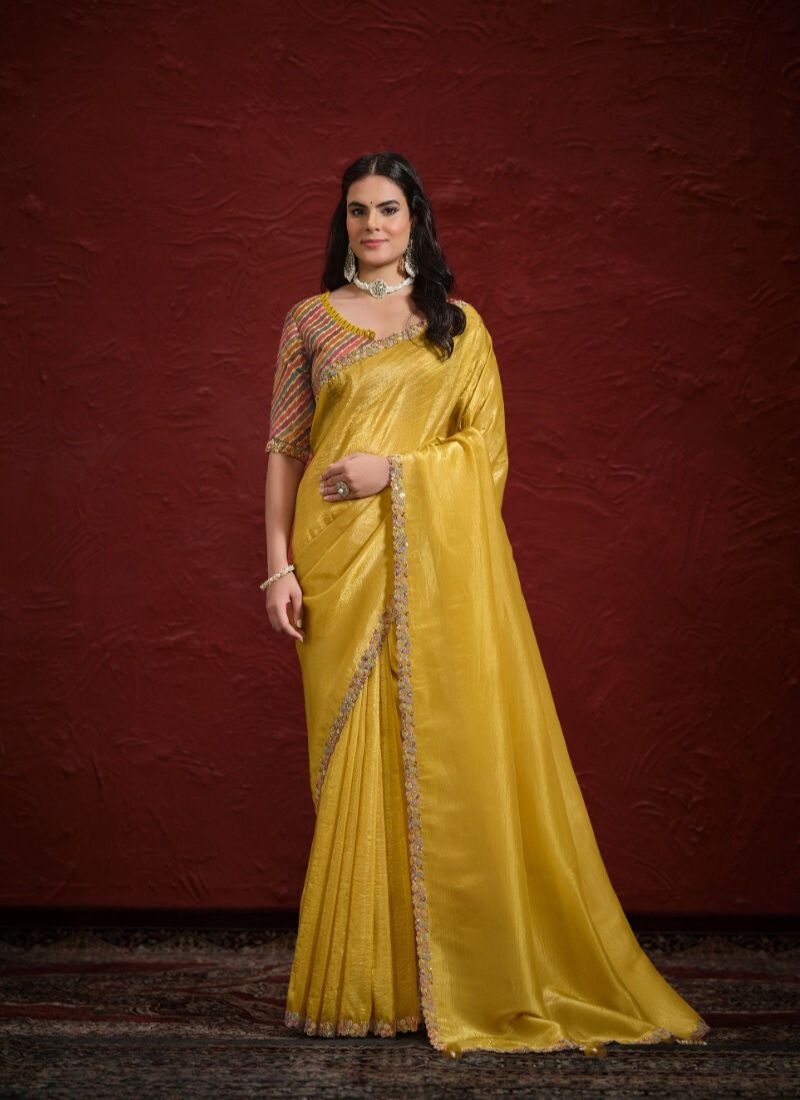 Stunning embroidered silk saree in mustard